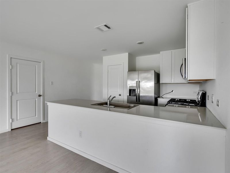 Furnished interior view inside a new home in , Katy (Image 17).