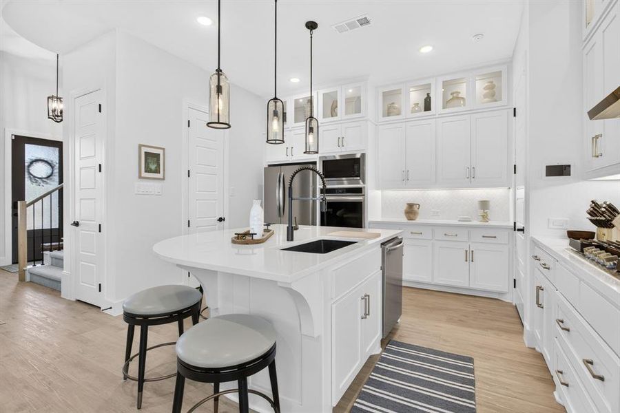 We also love the huge extra bank of cabinets and counter space, the double ovens, and the walk-in pantry! We also love the huge extra bank of cabinets and counter space, the double ovens, and the walk-in pantry!