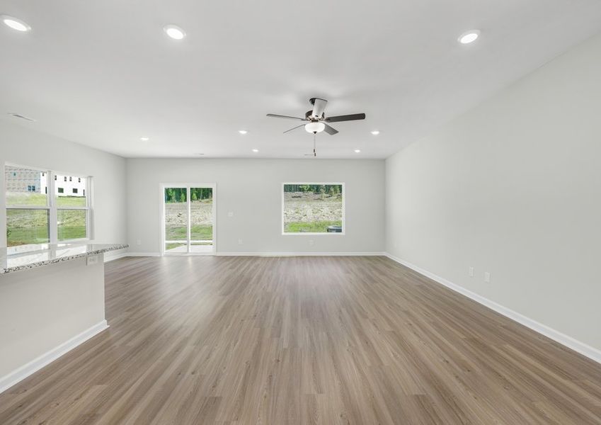 The living room is the heart of the home connecting the kitchen and dining room The living room is the heart of the home connecting the kitchen and dining room