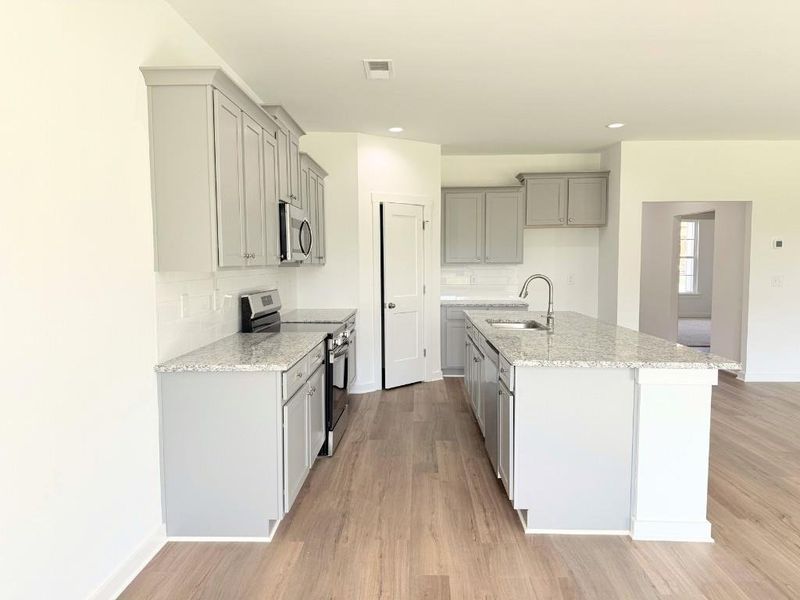 Furnished interior view inside a new home in Westlyn, Winder (Image 7).