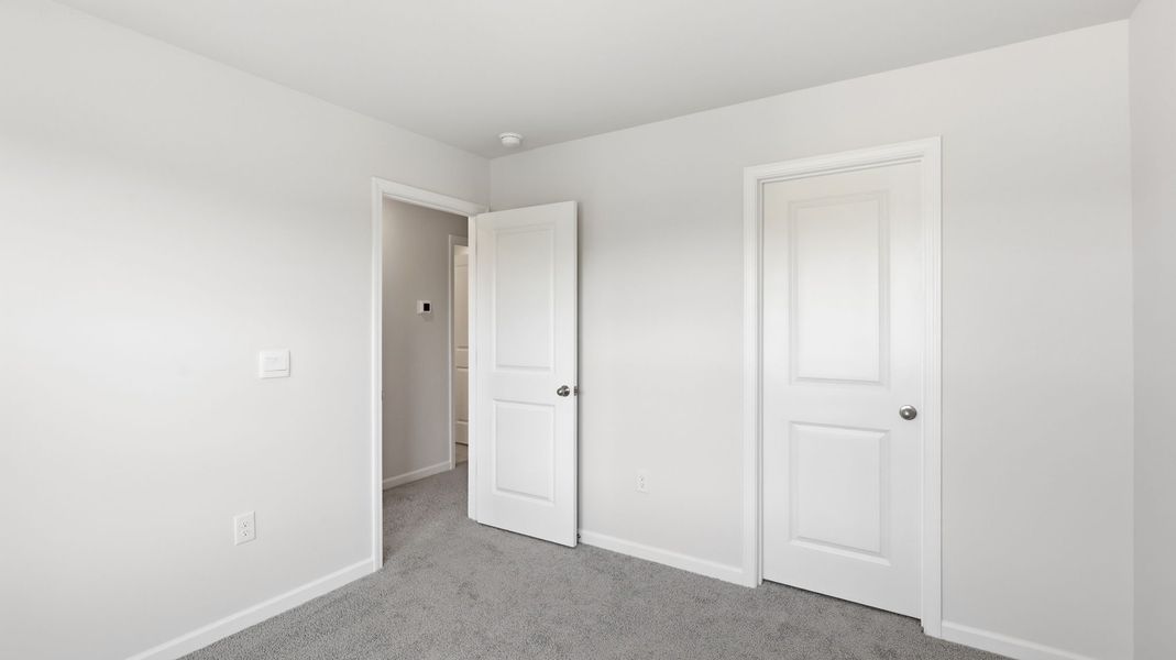 Spacious, unfurnished interior of a new home in Townes at Tap Root Farms, Fletcher (Image 24). Spacious, unfurnished interior of a new home in Townes at Tap Root Farms, Fletcher (Image 24).