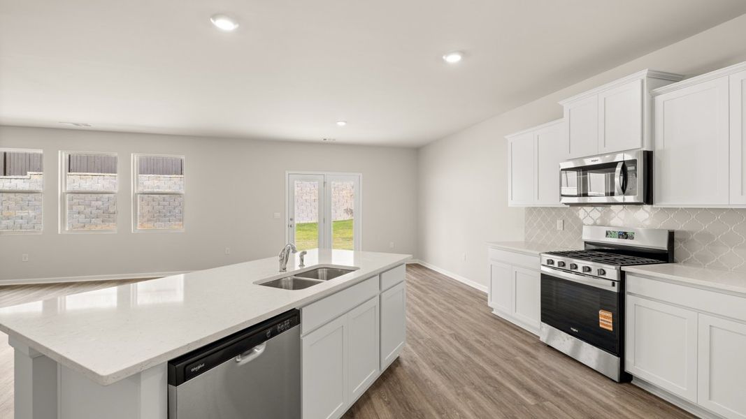 Representative furnished interior of a home built from the Avion by D.R. Horton in Brooks Station, Dacula (Image 4).