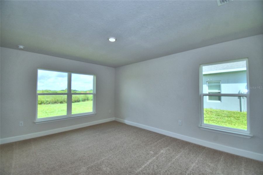 Spacious, unfurnished interior of a new home in Cadence Crossing, Auburndale (Image 32).