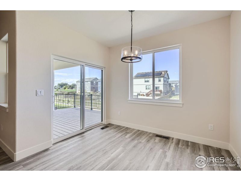 Dining room with patio door to the back deck.