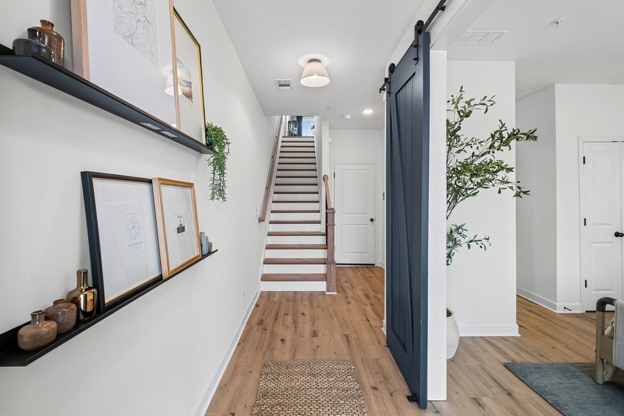 Representative furnished interior of a home built from the The Greenfield by JW Collection in The Village at River Green, Canton (Image 6).