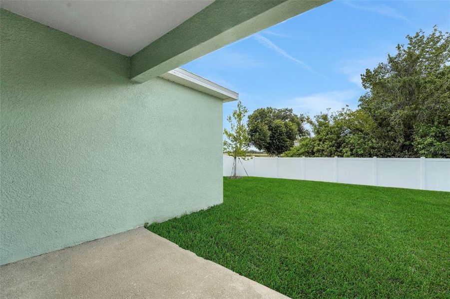 Exterior details and patio area of a home in Annabelle Estates, Winter Haven (Image 20).