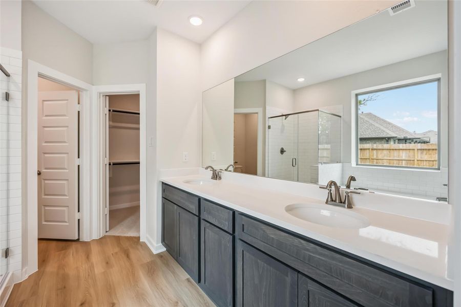 Furnished interior view inside a new home in Deer Pines, Conroe (Image 9).