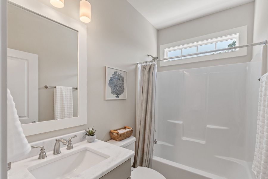 Furnished interior view inside a new home in Osprey Landing, Southport (Image 8).