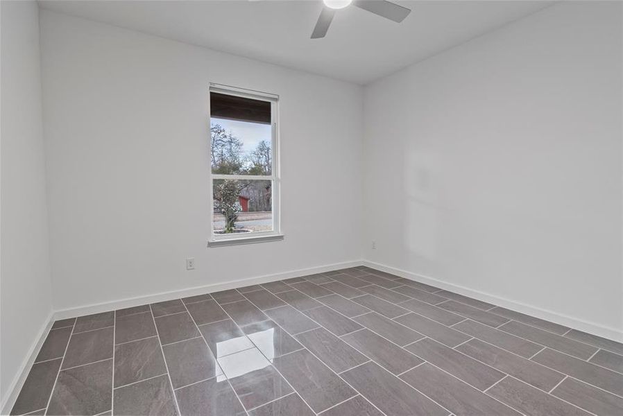 Unfurnished room with ceiling fan