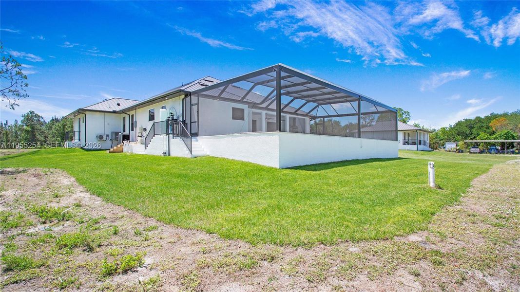 Exterior details and patio area of a home in , Naples (Image 33).