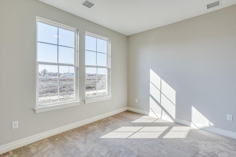 Spacious, unfurnished interior of a new home in The Courtyards at Cornerstone, Andover (Image 12).