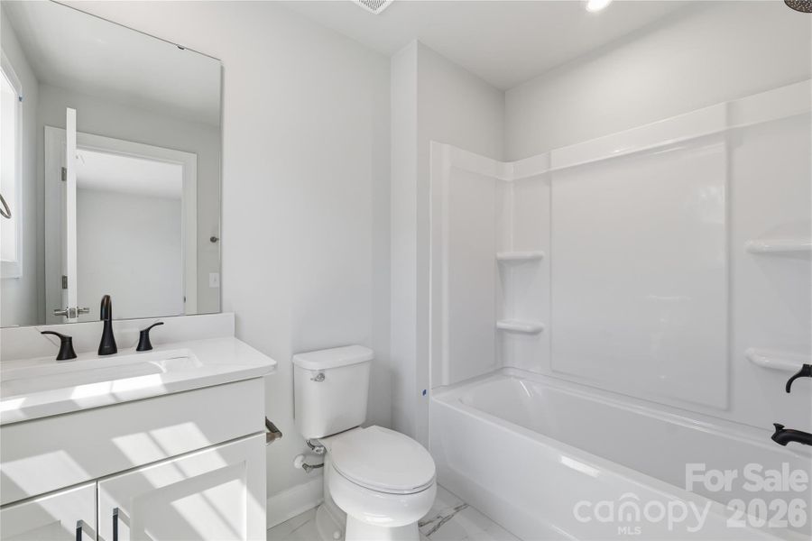 Example Photo Example Photo