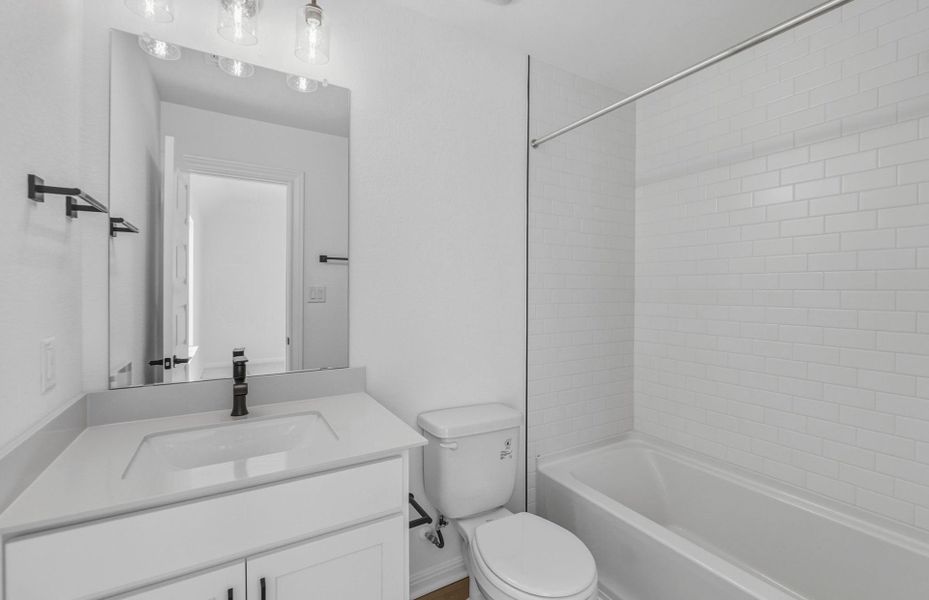 Furnished interior view inside a new home in Bluffview Reserve, Leander (Image 11).