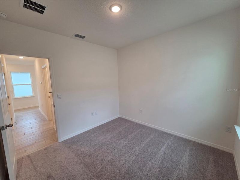 Spacious, unfurnished interior of a new home in Hammock Reserve, Haines City (Image 16). Spacious, unfurnished interior of a new home in Hammock Reserve, Haines City (Image 16).