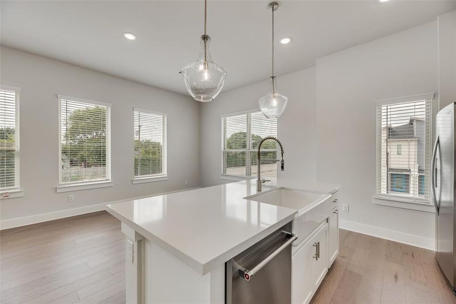 Furnished interior view inside a new home in Collin Creek, Plano (Image 5).