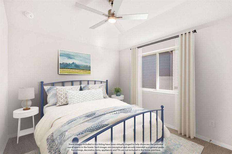 Bedroom with blue metal bed frame, ceiling fan, and window with curtains