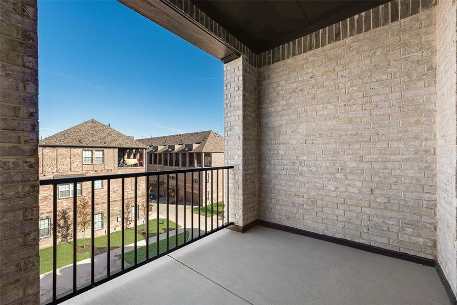 Exterior details and patio area of a home in Wade Settlement Townhomes, Frisco (Image 19).