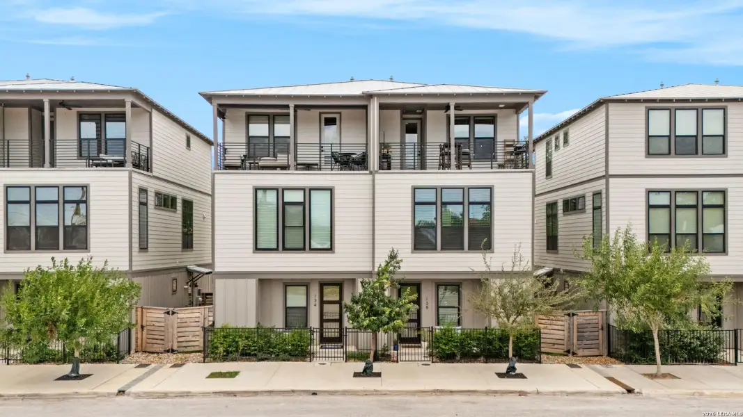 Front exterior of a new home in Playmoor, San Antonio, TX, highlighting curb appeal (Image 26).
