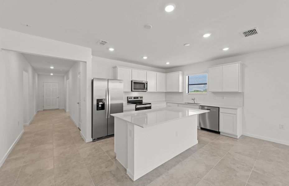 Furnished interior view inside a new home in Caloosa Cove, Labelle (Image 7).