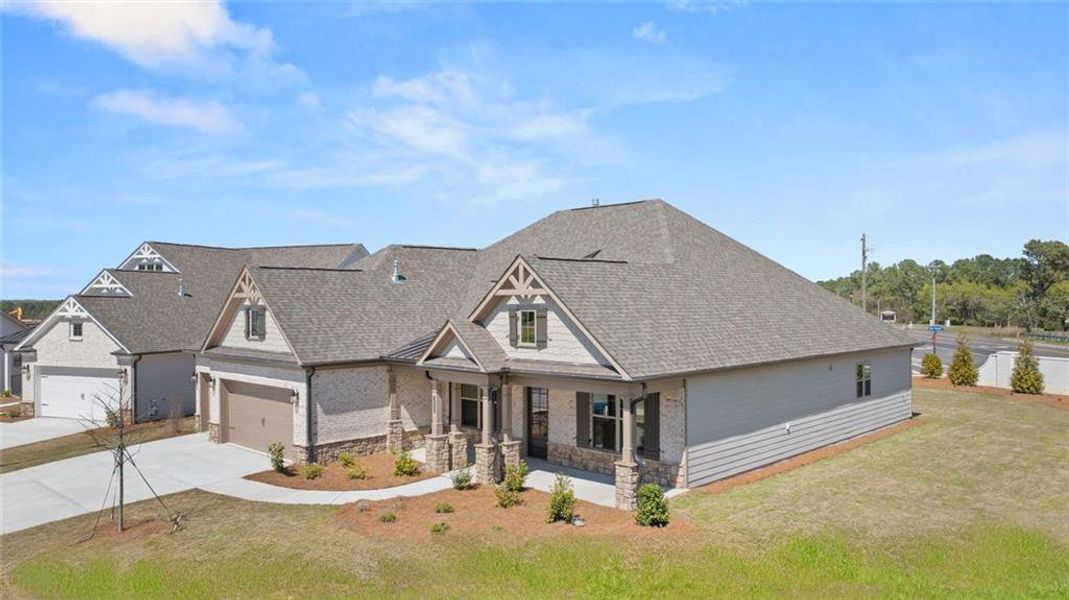 Front exterior of a new home in Soleil Summit Chase, Snellville, GA, highlighting curb appeal (Image 19).
