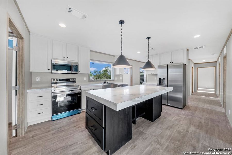 Furnished interior view inside a new home in , Moore (Image 5).