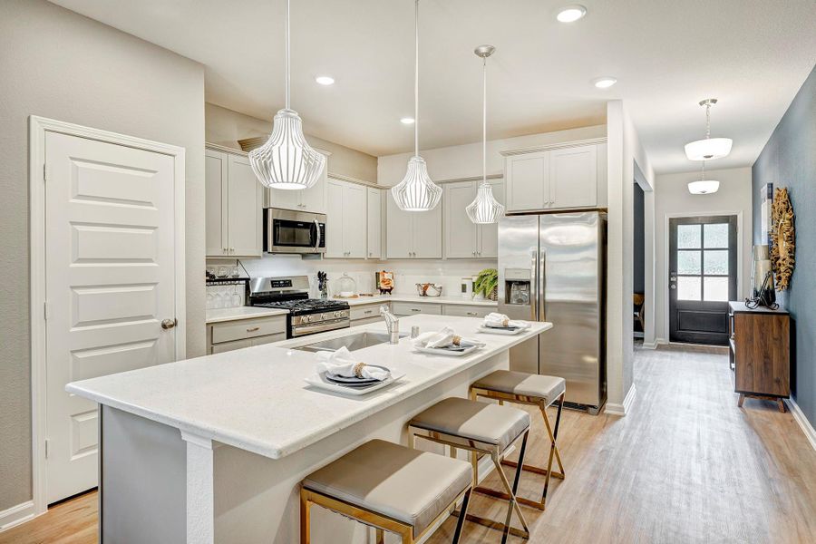 The Oakshire II- Kitchen. Home under construction. Sample floor plan photo used for illustrative purposes only. Upgrades, selections options, windows and colors may vary.