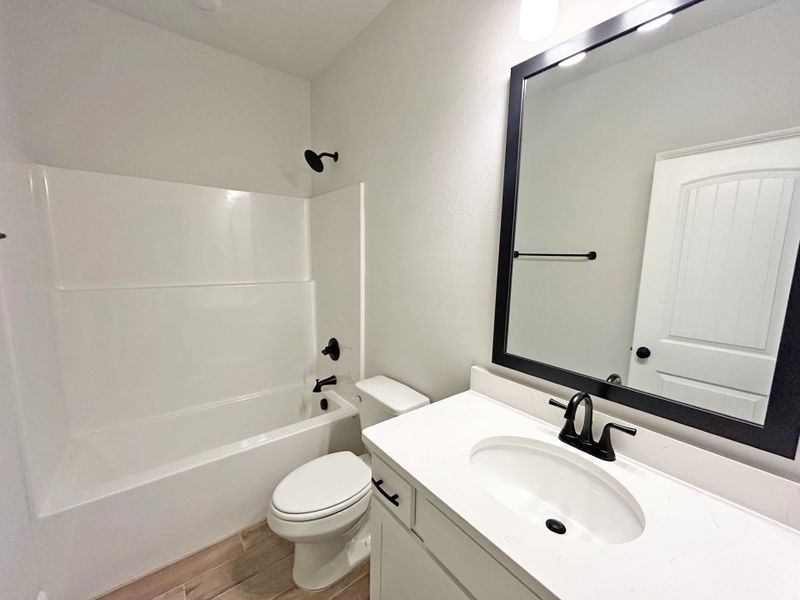 Furnished interior view inside a new home in The Bluffs at Lafayette, Freeport (Image 14).