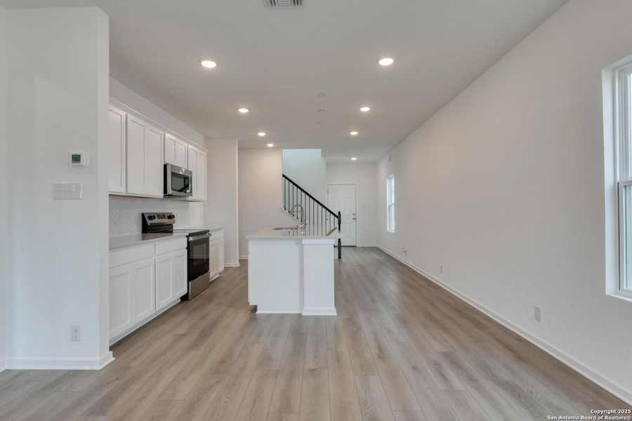Furnished interior view inside a new home in Meadows at Hennersby Hollow 40's, San Antonio (Image 11).