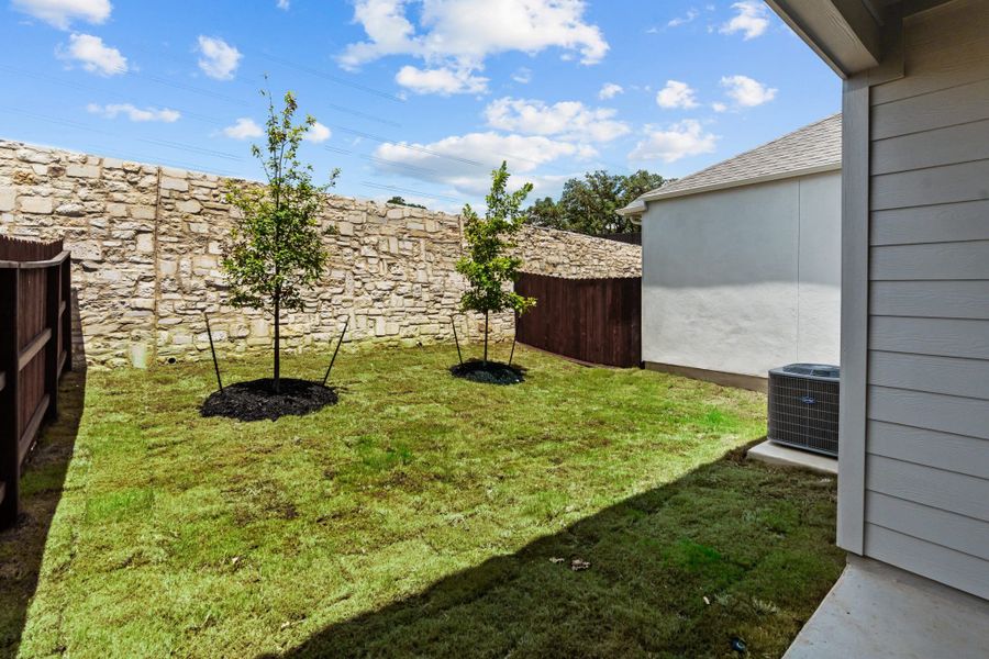 Exterior details and patio area of a home in Centero at Stone Oak, San Antonio (Image 21).