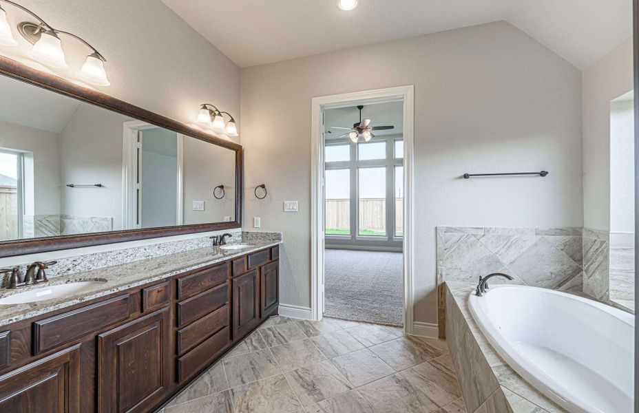 Representative furnished interior of a home built from the 3326 by Ravenna Homes in Cross Creek West, Fulshear (Image 33).
