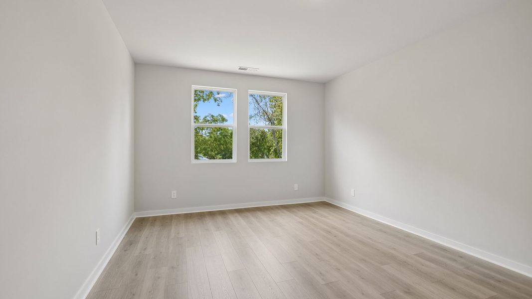 Representative unfurnished interior of a home built from the Ansley by D.R. Horton in Harvest Point, Spring Hill (Image 58).