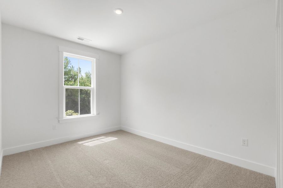 Spacious, unfurnished interior of a new home in Long Bay Golf Club, Longs (Image 37).
