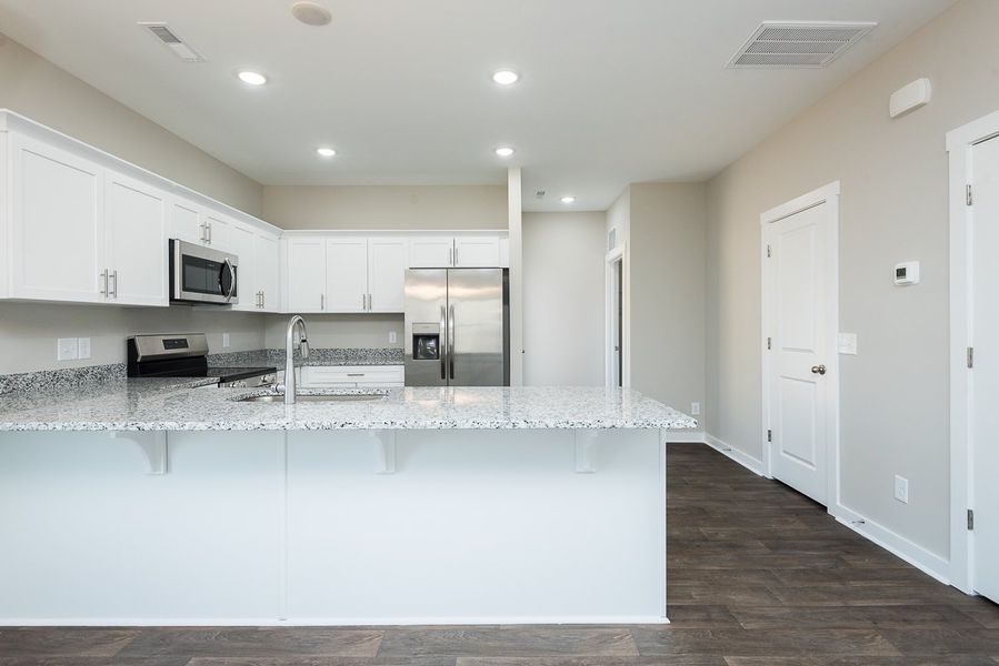 Representative furnished interior of a home built from the TH 1425 END by Foundation Home Builders LLC in Stokesburg Road Townhomes, Walnut Cove (Image 11).