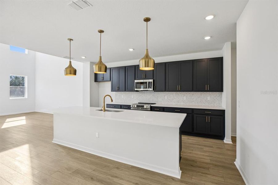 Furnished interior view inside a new home in Northlake at Ovation, Winter Garden (Image 8).