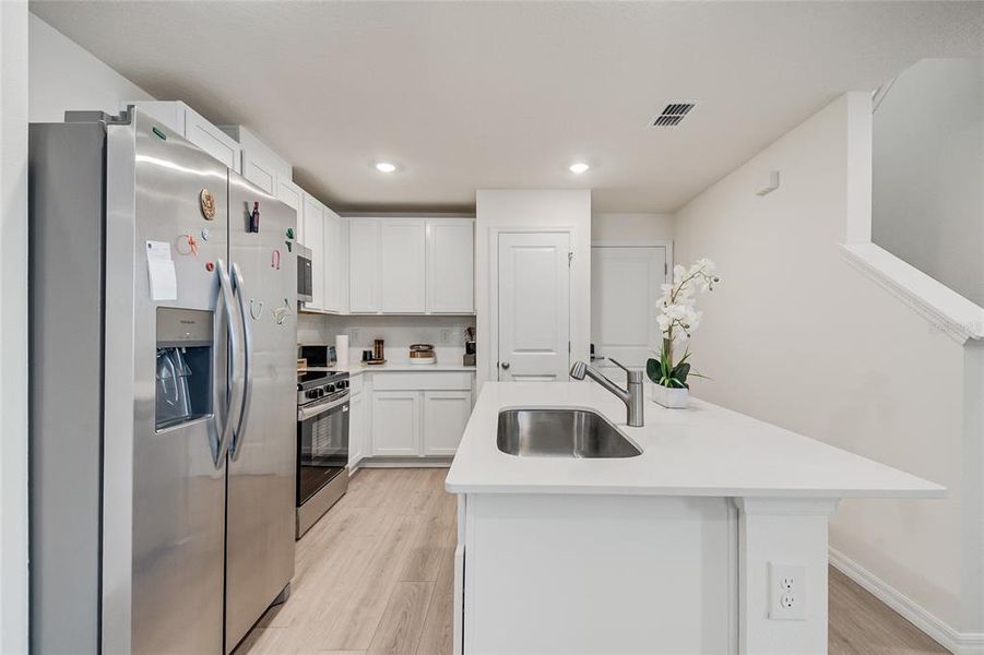 Furnished interior view inside a new home in , Kissimmee (Image 6).