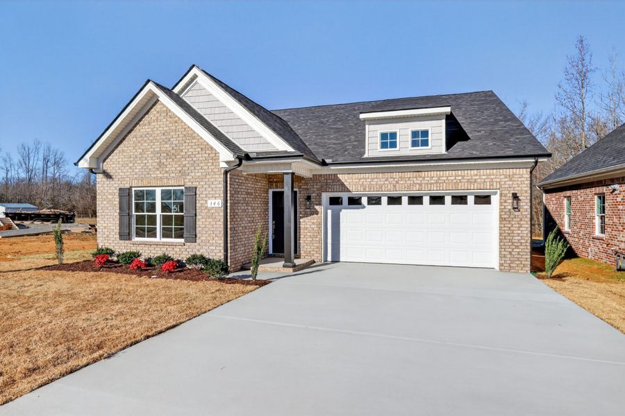 Front exterior of a new home in Legacy Preserve, Tullahoma, TN, highlighting curb appeal (Image 22).