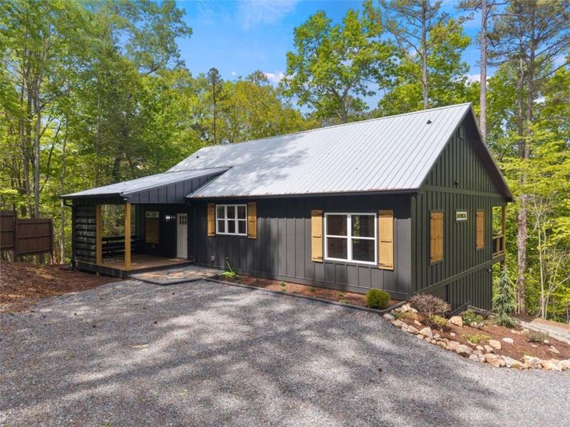 Exterior details and patio area of a home in , Ellijay (Image 24).