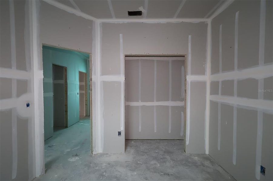 In-progress construction of a new home in Lake Star at Ovation, Winter Garden, FL (Image 14).