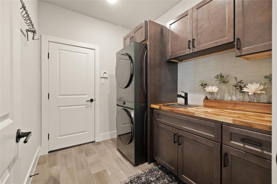 Sellers added these cabinets and the washer/dryer stays