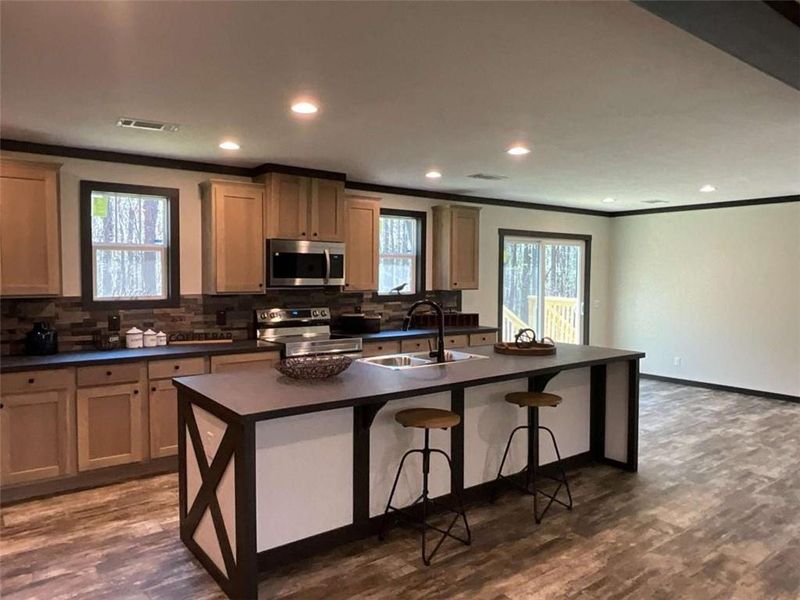 Furnished interior view inside a new home in , Eatonton (Image 8).