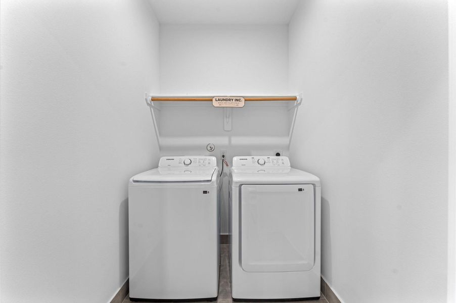 Conveniently located on the second floor, this laundry area offers easy access from nearby bedrooms—streamlining daily routines and minimizing stair traffic. Conveniently located on the second floor, this laundry area offers easy access from nearby bedrooms—streamlining daily routines and minimizing stair traffic.