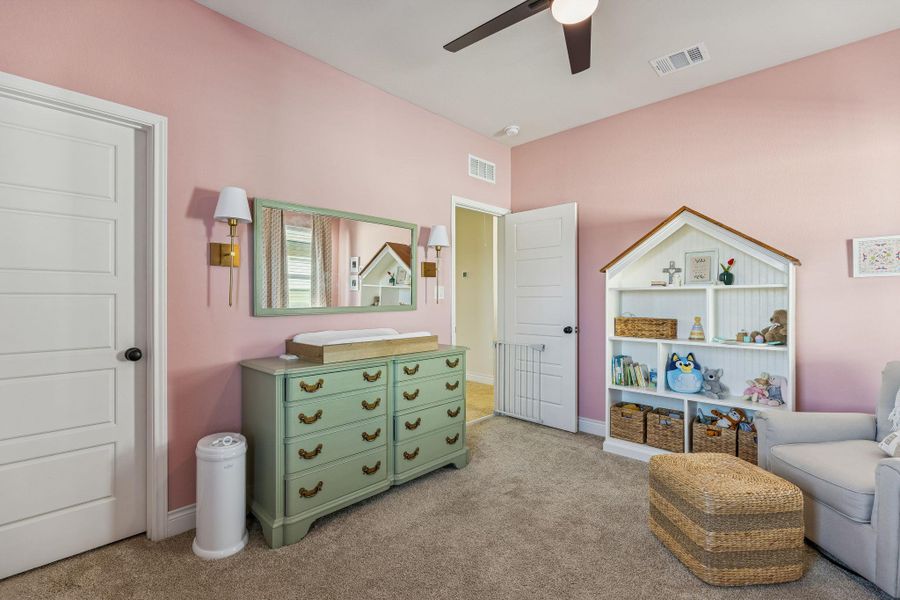 Upstairs bedroom upstairs with carpet