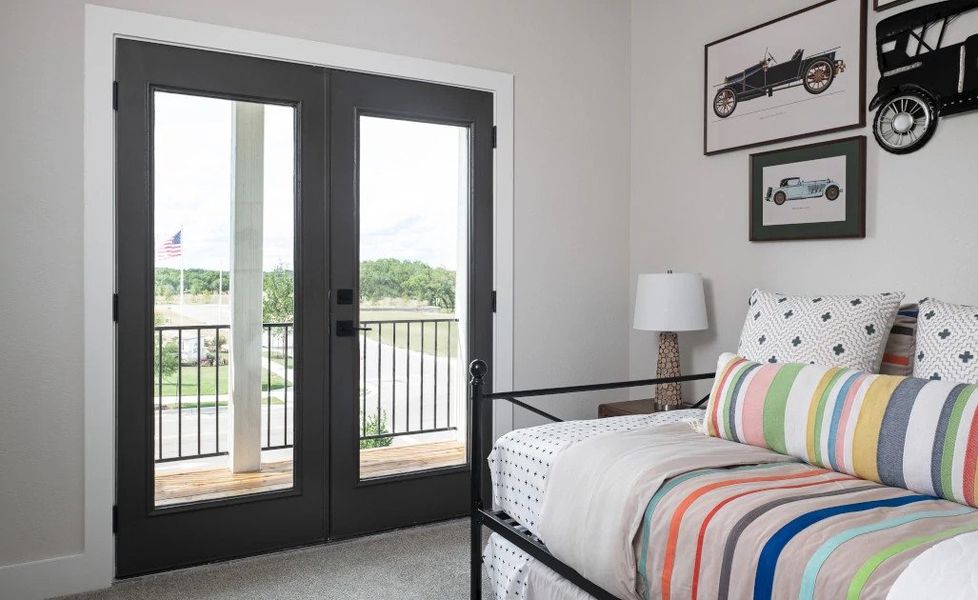 Representative furnished interior of a home built from the Blue Jay by Ashton Woods in Lariat, Liberty Hill (Image 12).