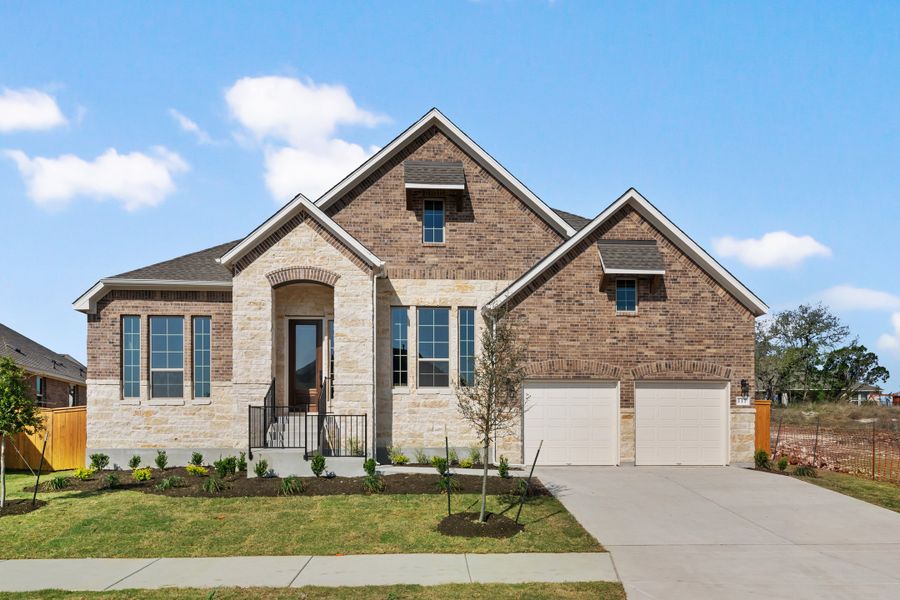Representative exterior photo of a completed home built from the Maxwell by Ashton Woods in The Estates at La Cima, San Marcos, TX (Image 1). Representative exterior photo of a completed home built from the Maxwell by Ashton Woods in The Estates at La Cima, San Marcos, TX (Image 1).