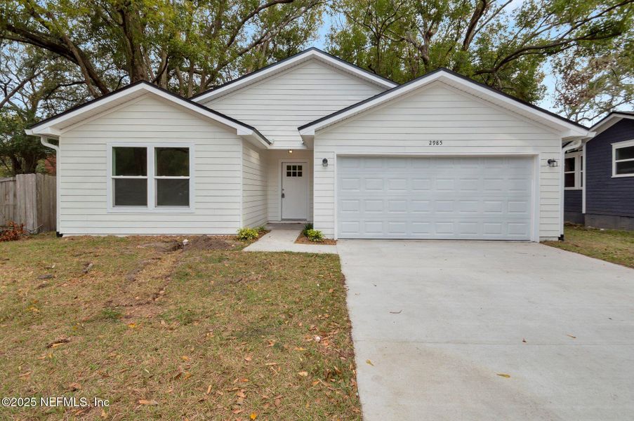 Front exterior of a new home in , Jacksonville, FL, highlighting curb appeal (Image 2). Front exterior of a new home in , Jacksonville, FL, highlighting curb appeal (Image 2).