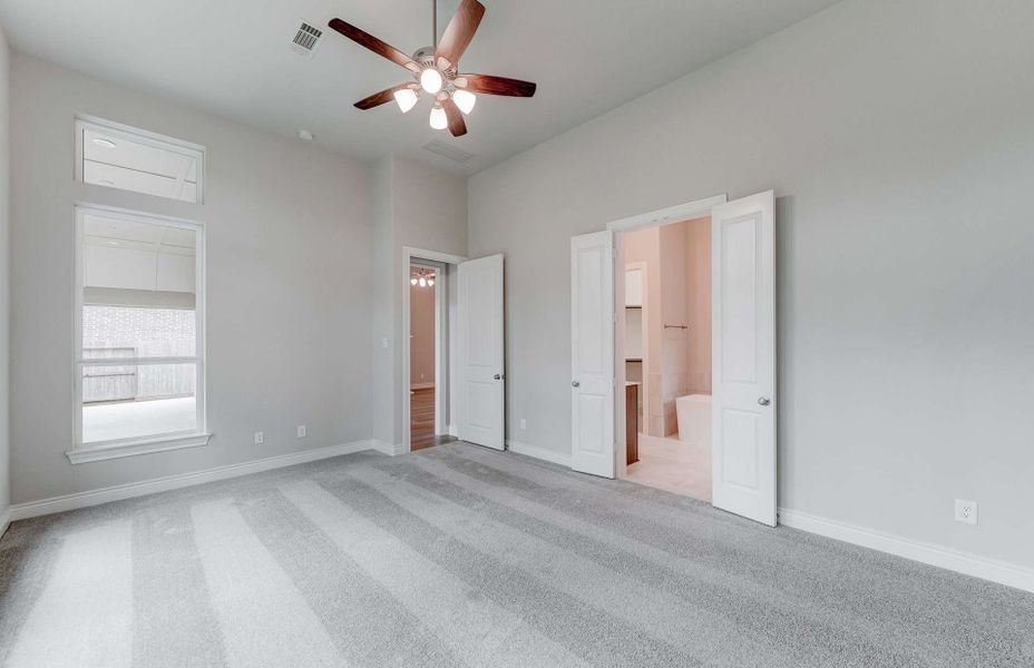 Representative unfurnished interior of a home built from the 3049 by Ravenna Homes in The Woodlands Hills 65′, Willis (Image 30). Representative unfurnished interior of a home built from the 3049 by Ravenna Homes in The Woodlands Hills 65′, Willis (Image 30).