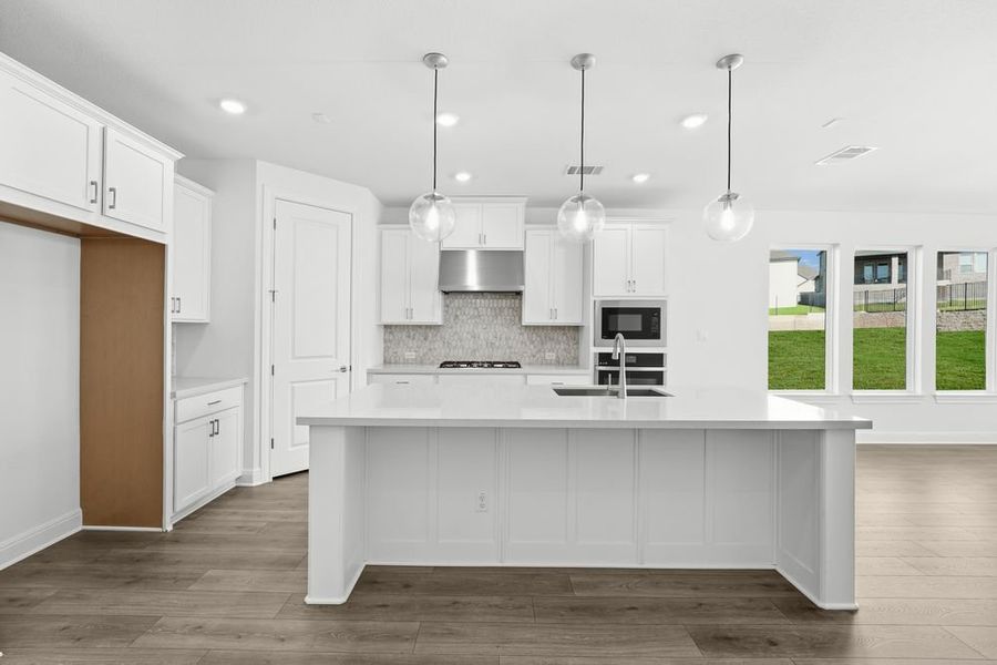Furnished interior view inside a new home in Travisso, Leander (Image 4).