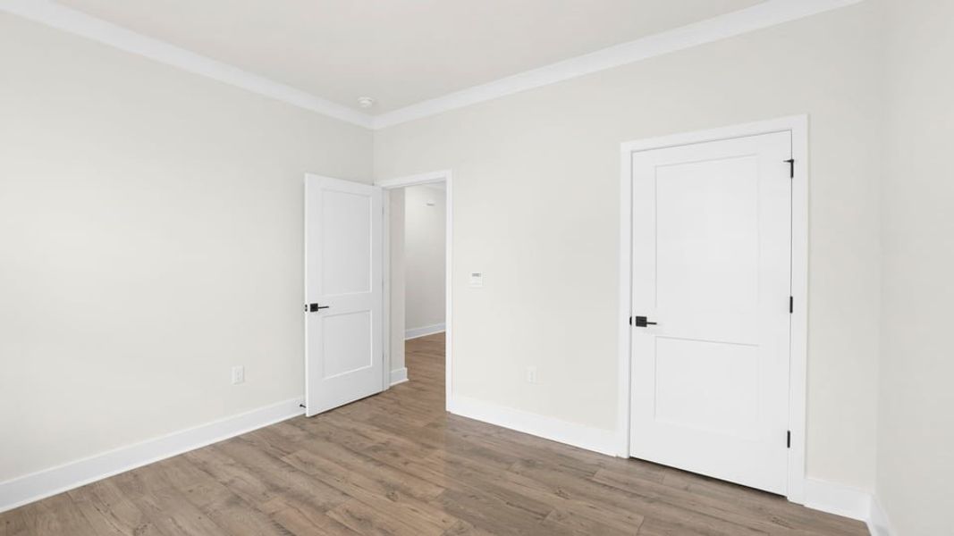 Spacious, unfurnished interior of a new home in Adams Glen, Greenville (Image 29).