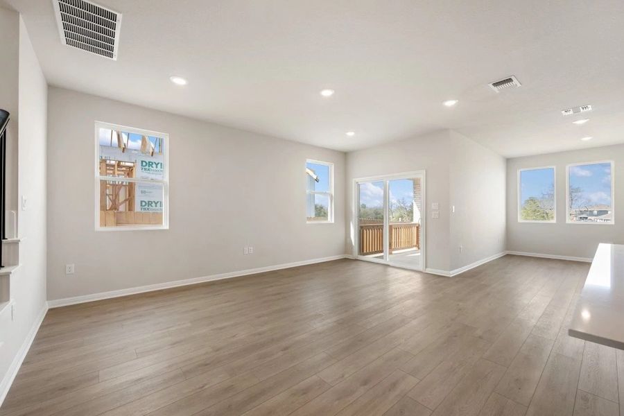 Spacious, unfurnished interior of a new home in The Colony, Bastrop (Image 28).