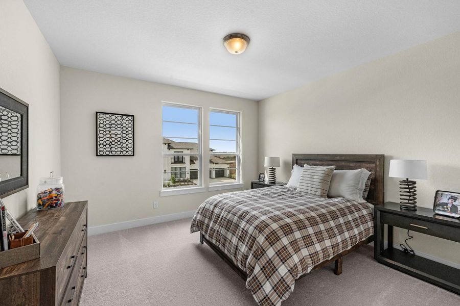 Furnished interior view inside a new home in Bridgeland, Cypress (Image 27).